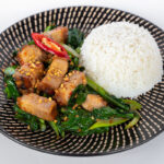 Pad Kana Moo Grob (Served with Rice)